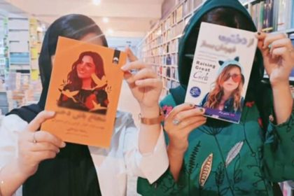 Women protesters distribute books to girls in Kabul province