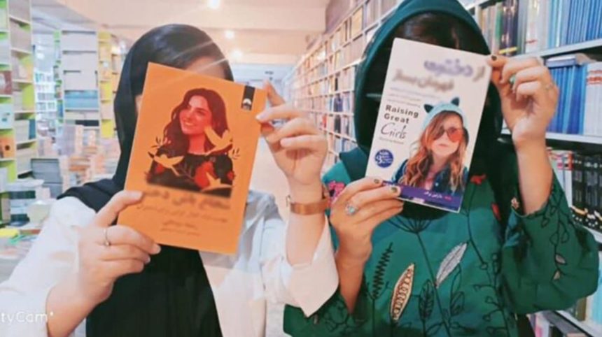 Women protesters distribute books to girls in Kabul province